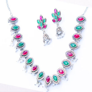 Beautiful Eye Design Ruby and Emerald Embedded Neck Piece + Earrings Set